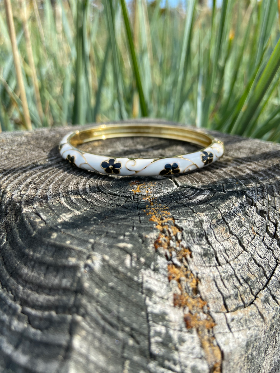 Gold Tone Black and White Enamel Spring Hinge Bangle